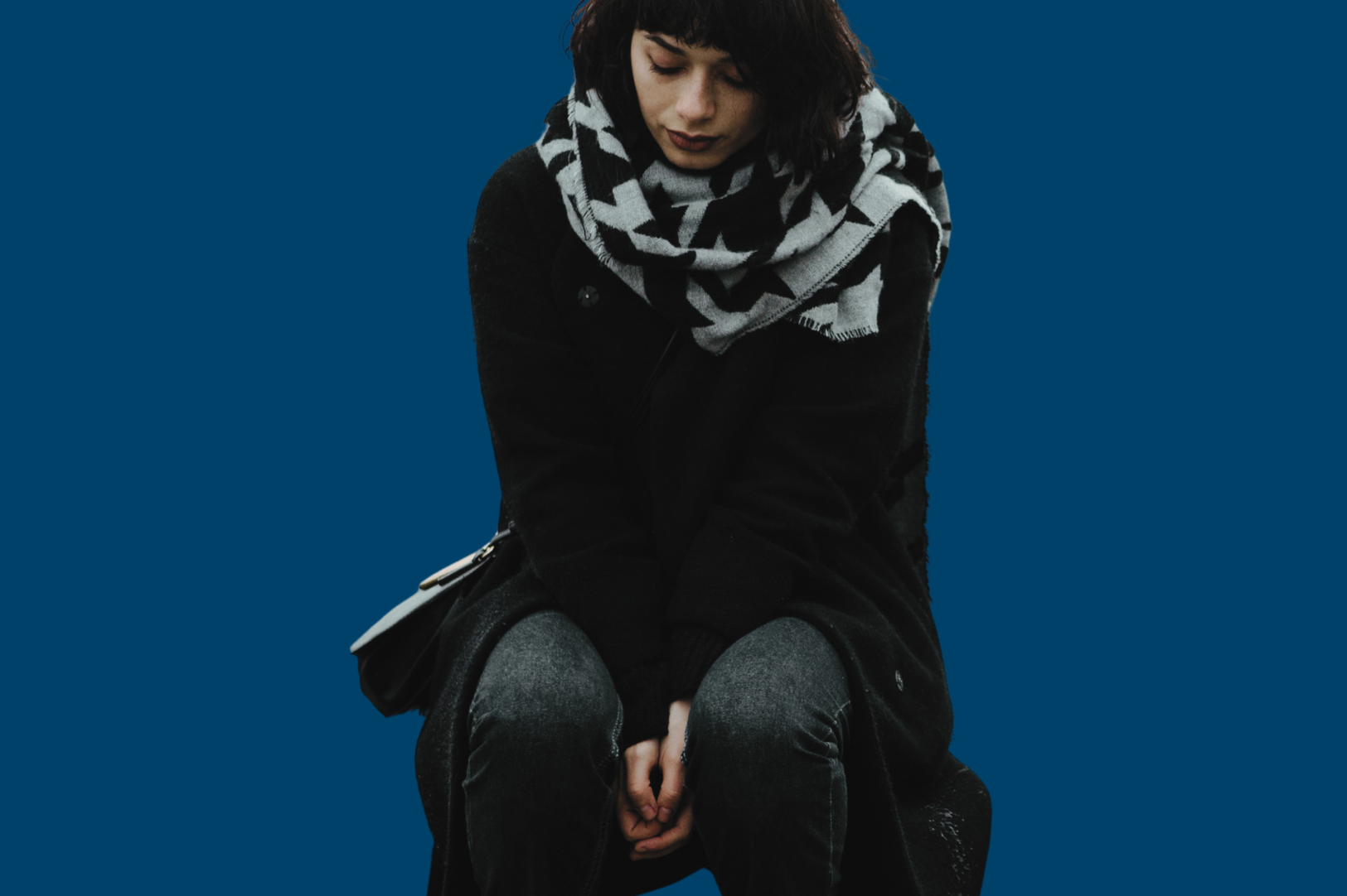 Ein person med skjerf