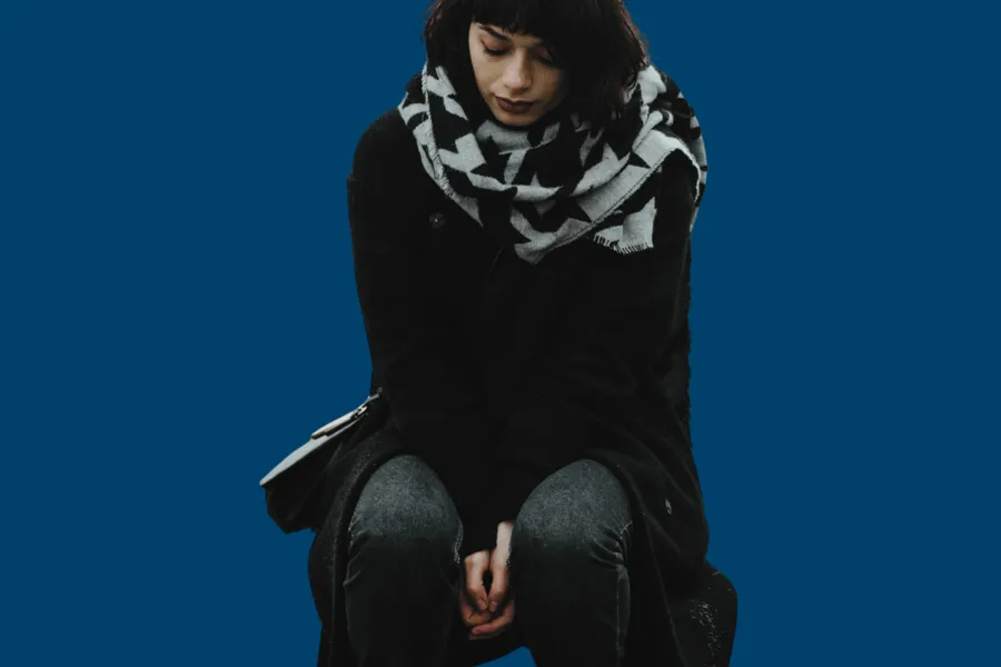 Ein person med skjerf