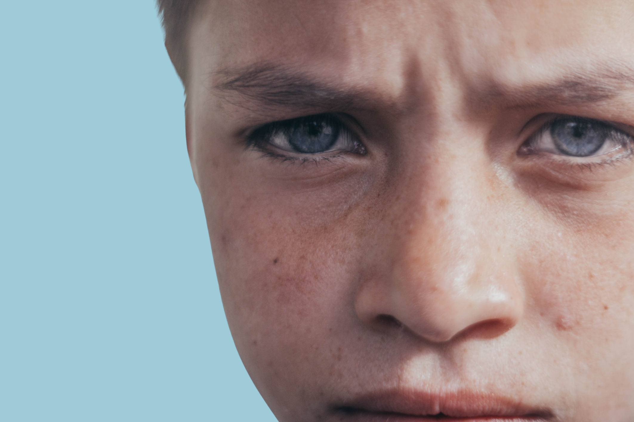 Nærbilete av ein gut sitt ansikt