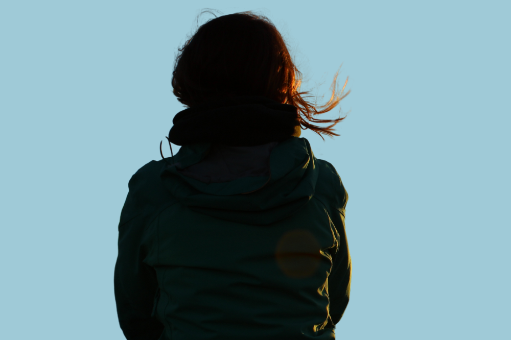 Ryggen til ei kvinne. 