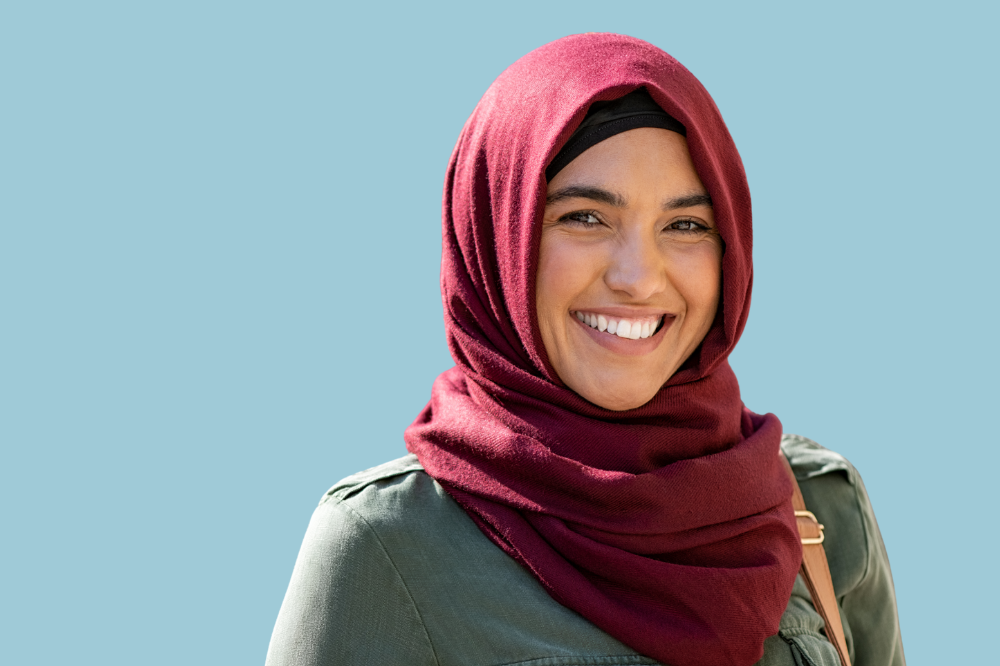 Ei kvinne med rosa hijab